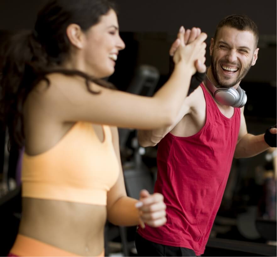 young-couple-running-on-treadmills-in-modern-gym-2023-11-27-05-07-51-utc
